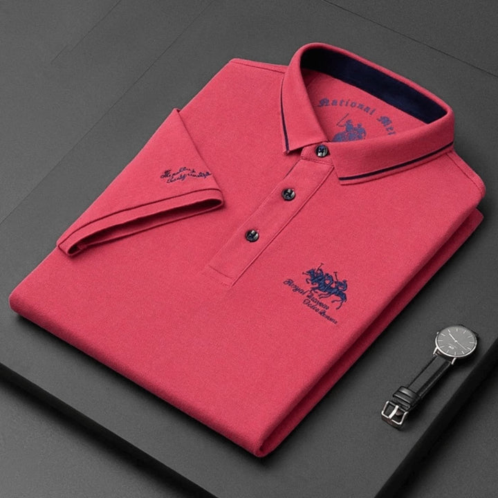 Back view of a comfortable, breathable embroidered men's polo top, showcasing its versatile fit & design.