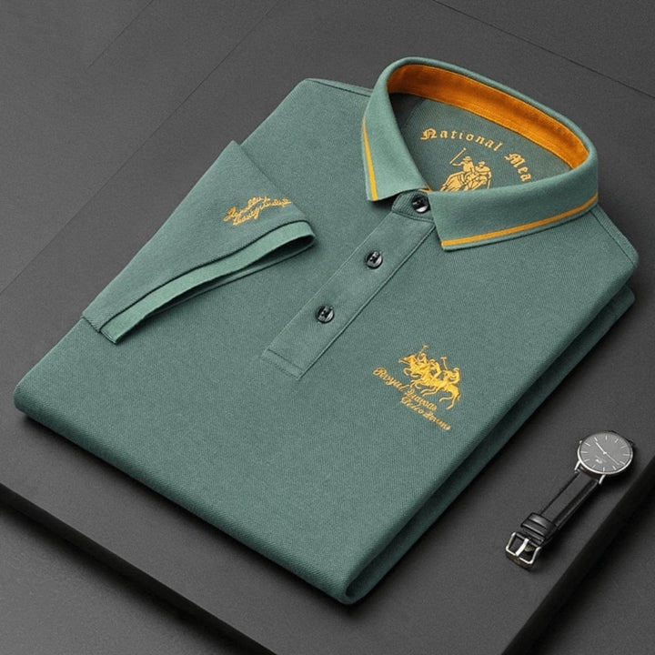 Folded stack of men's versatile, breathable embroidered polo tops in various colors, ideal for summer.