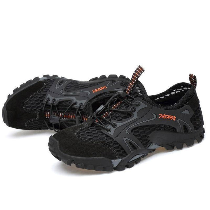 Adventure-ready men's hiking shoes, featuring anti-slip soles for secure climbing & trekking.