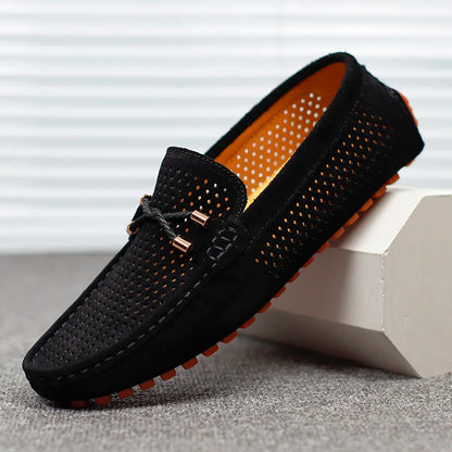Perforated leather men's slip-on loafers. Ideal for breathable comfort, casual style & summer fashion.
