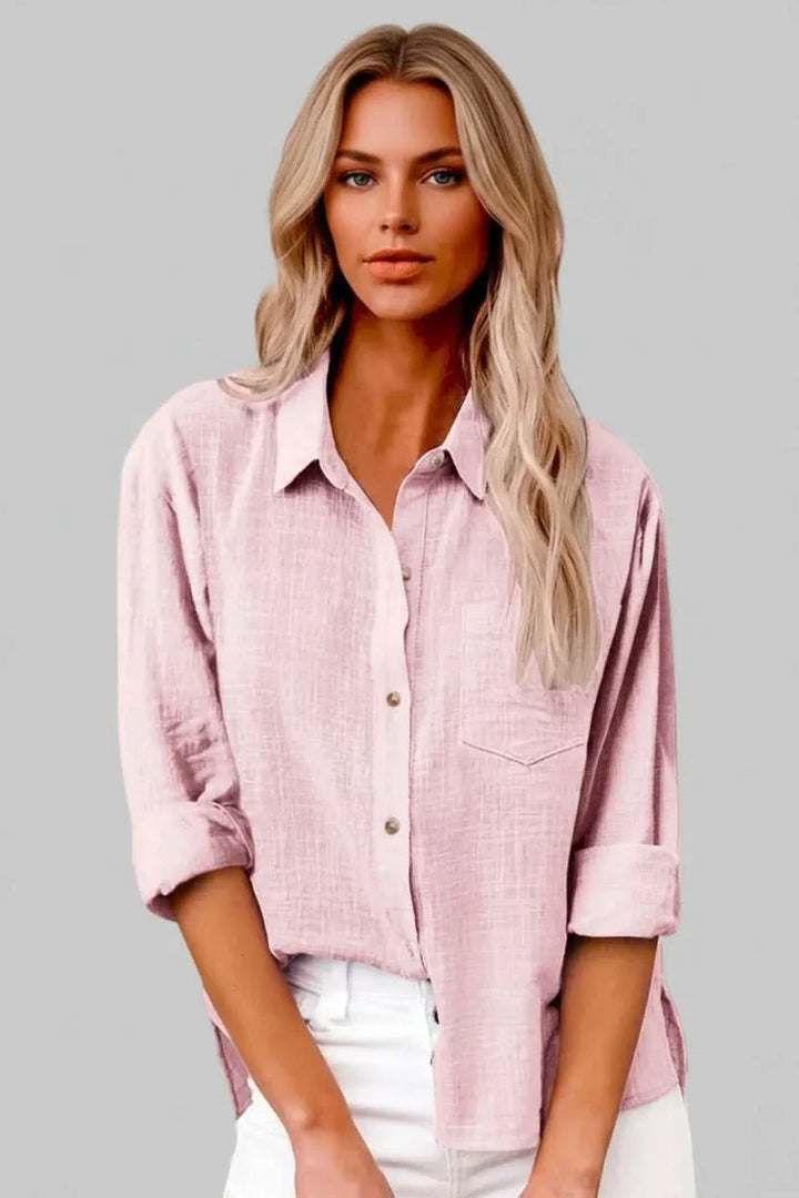 Relaxed fit men's solid button-up shirt. Breathable, lightweight design perfect for versatile spring & summer wear.