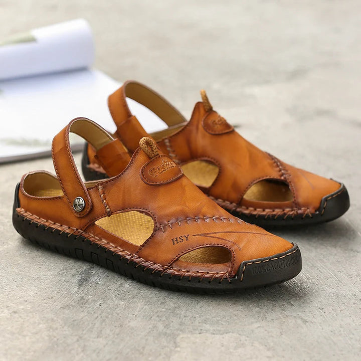 Breathable closed-toe men's sandals, non-slip sole for secure outdoor adventures.