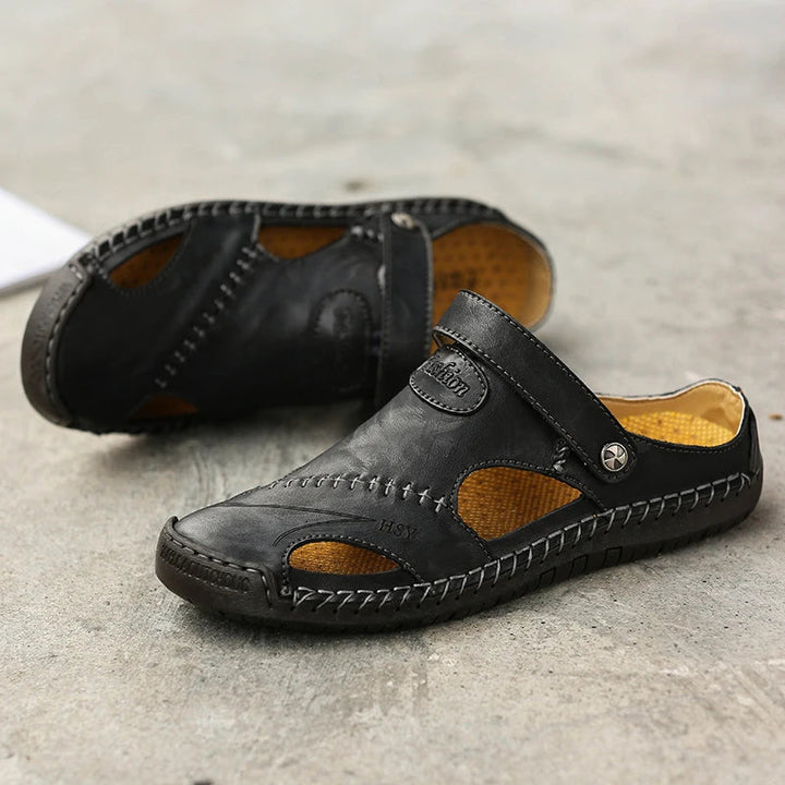 Stylish men's slip-on sandals, cushioned arch support for ultimate comfort.