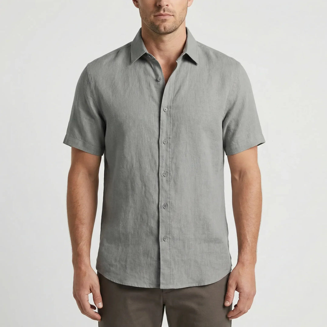 Lightweight men's button-up shirt, breezy and short-sleeved, perfect for casual summer outings.