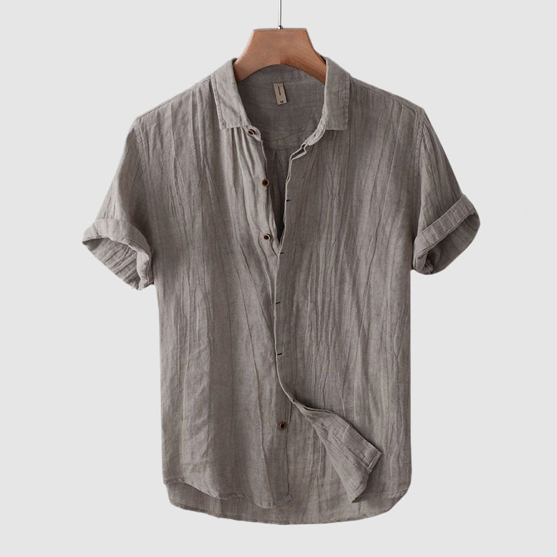 Casual men's short sleeve button-up shirt for summer. Effortless, breezy top for relaxed everyday style.