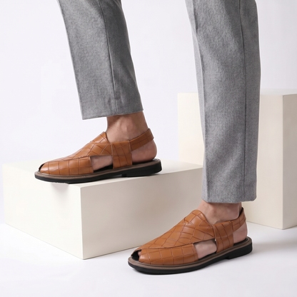 Close-up of men's Brenton durable outdoor sandals, highlighting grip soles & foot support.
