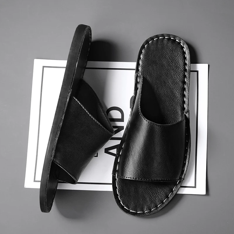 Men's casual black cross-strap sandals, essential summer fashion & beach shoes.