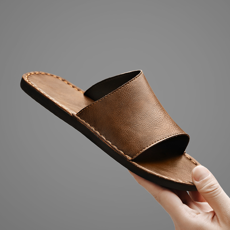 Durable men's cross-strap sandals, ideal for summer fashion & casual wear.