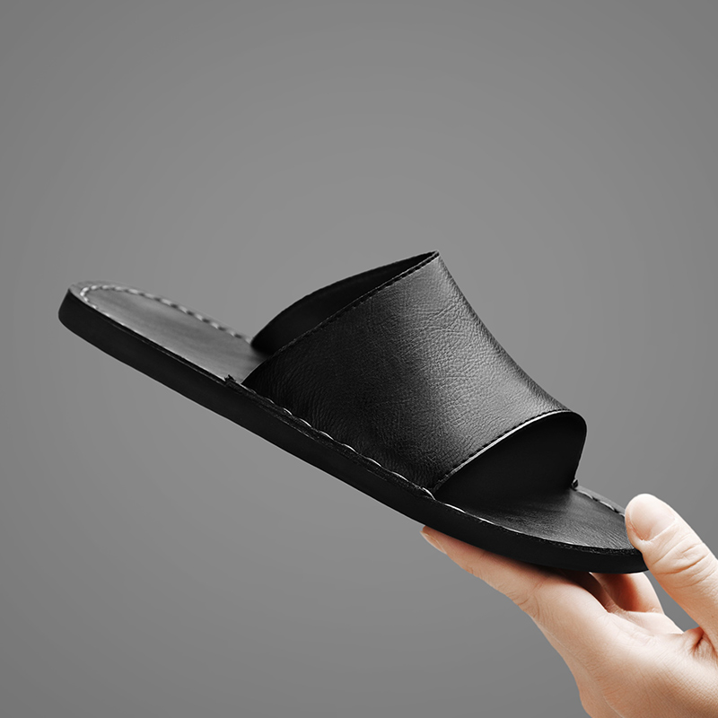Black men's comfort sandals, durable cross-strap design for summer casual shoes.
