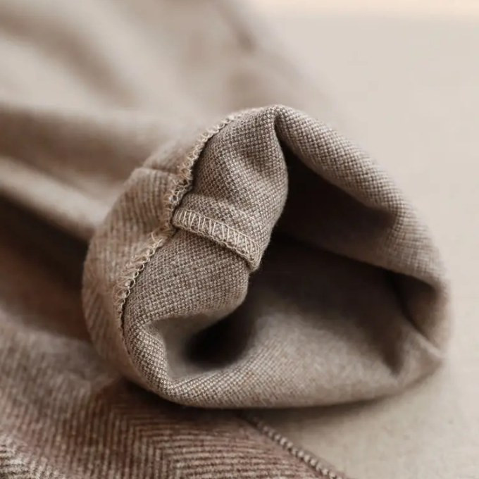 Professional men's tailored herringbone wool blend trousers, available in a smart beige tone.