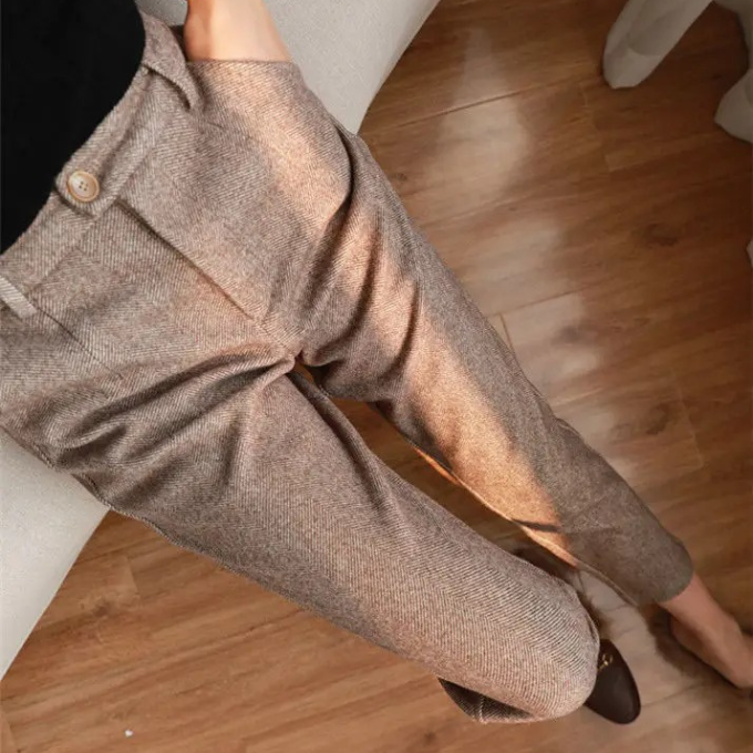 Classic men's beige herringbone wool blend tailored dress pants, a sophisticated choice.