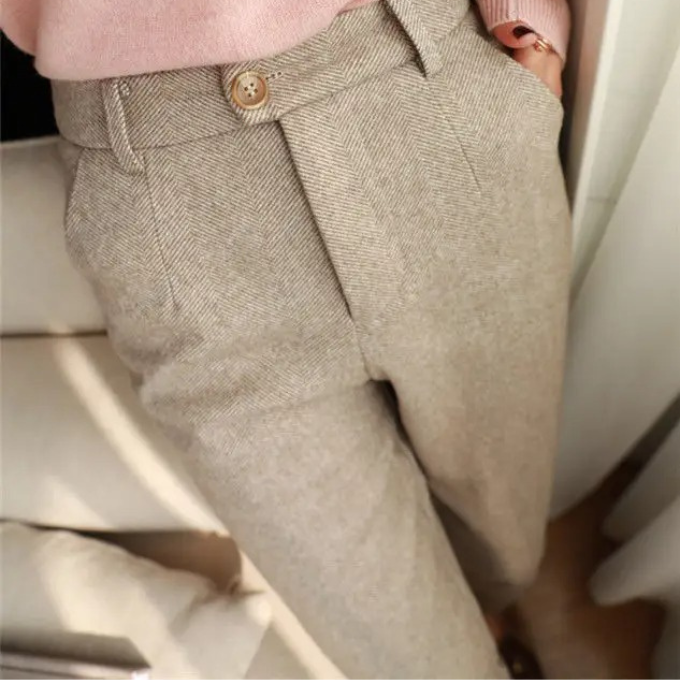 Durable wool blend men's herringbone trousers in a comfortable tailored fit, versatile style.