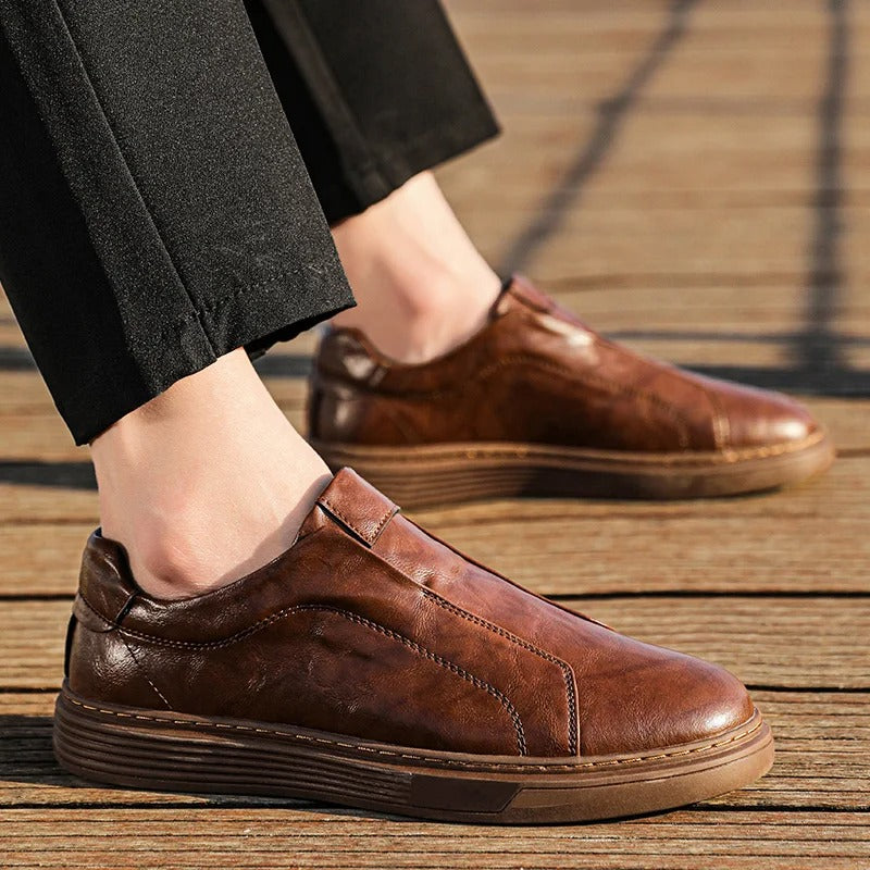 Comfortable men's brown leather slip-on shoes, ideal for casual everyday style. Easy to wear mensfootwear.