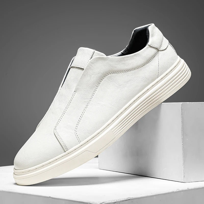 Durable men's brown leather casual slip-on shoes, perfect for everyday comfort and style. Essential mensfootwear.