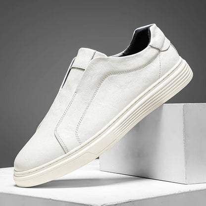 Durable men's brown leather casual slip-on shoes, perfect for everyday comfort and style. Essential mensfootwear.