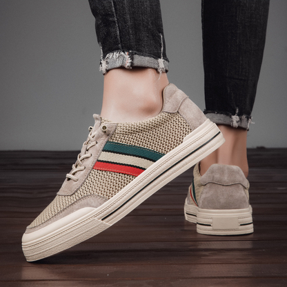 Front view of men's blue retro casual sneakers, ideal comfortable shoes for a modern lifestyle.