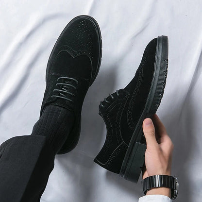 Detailed view of men's brown suede brogue shoes, showcasing the classic perforations and quality craftsmanship.