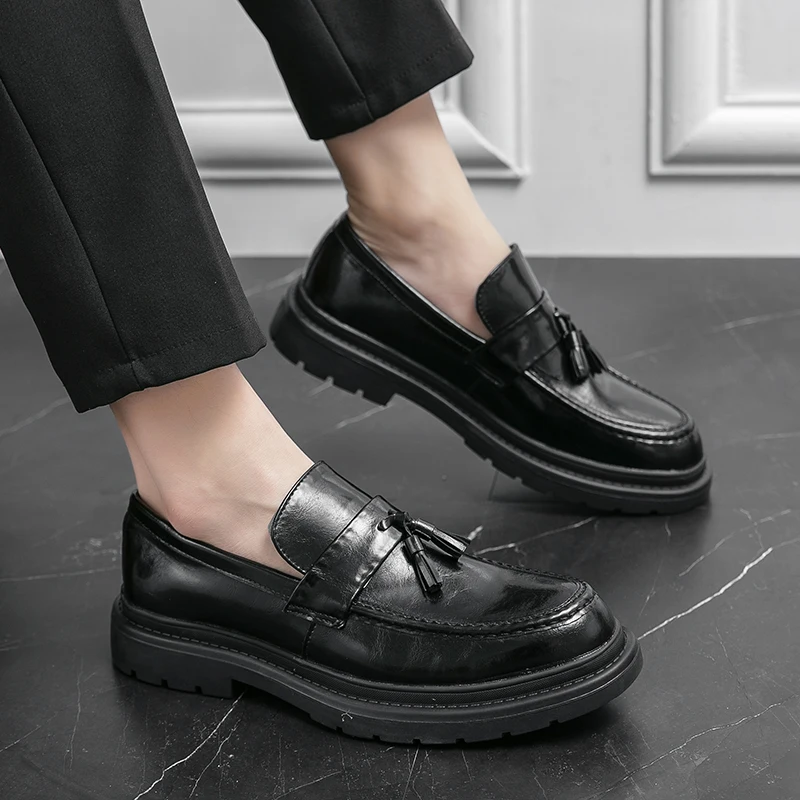 Modern men's tassel loafers, slip-on shoes combining fashion and everyday comfort.