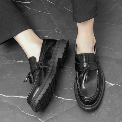Sophisticated men's tassel loafers, classic dress shoes offering modern style and comfort.