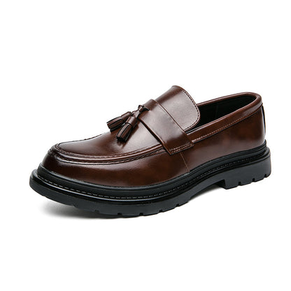 Fashionable men's tassel loafers, elegant formal footwear or smart casual slip-on shoes.