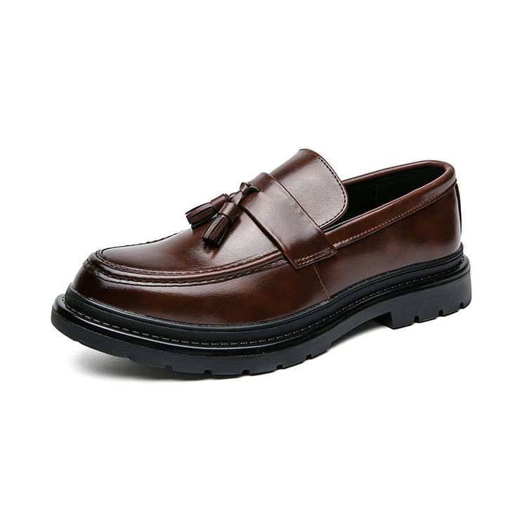 Fashionable men's tassel loafers, elegant formal footwear or smart casual slip-on shoes.