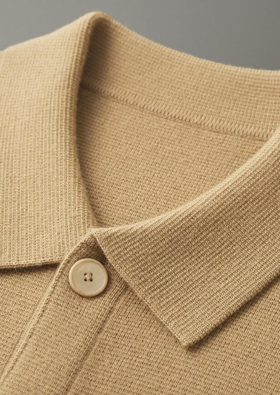 Smart casual men's button-up cardigan. A versatile, all-season outerwear layer with patch pockets.