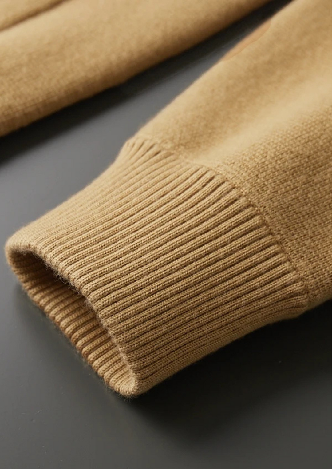 Men's button-up knit cardigan with patch pockets. A comfortable, stylish long-sleeve layer for men.