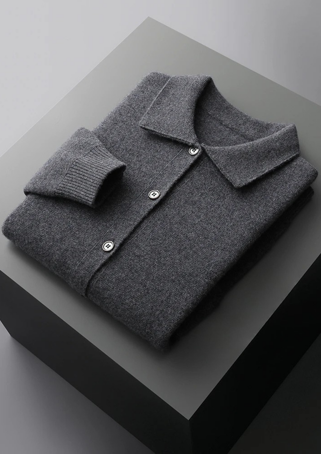 All-season men's button-up cardigan. Smart casual knitwear featuring practical patch pockets.