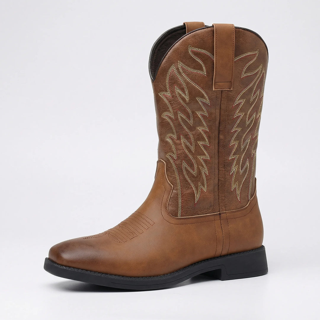 Men's calf-length western boots. Distinctive embroidered cowboy boots with a rugged slip-on style and solid block heel.