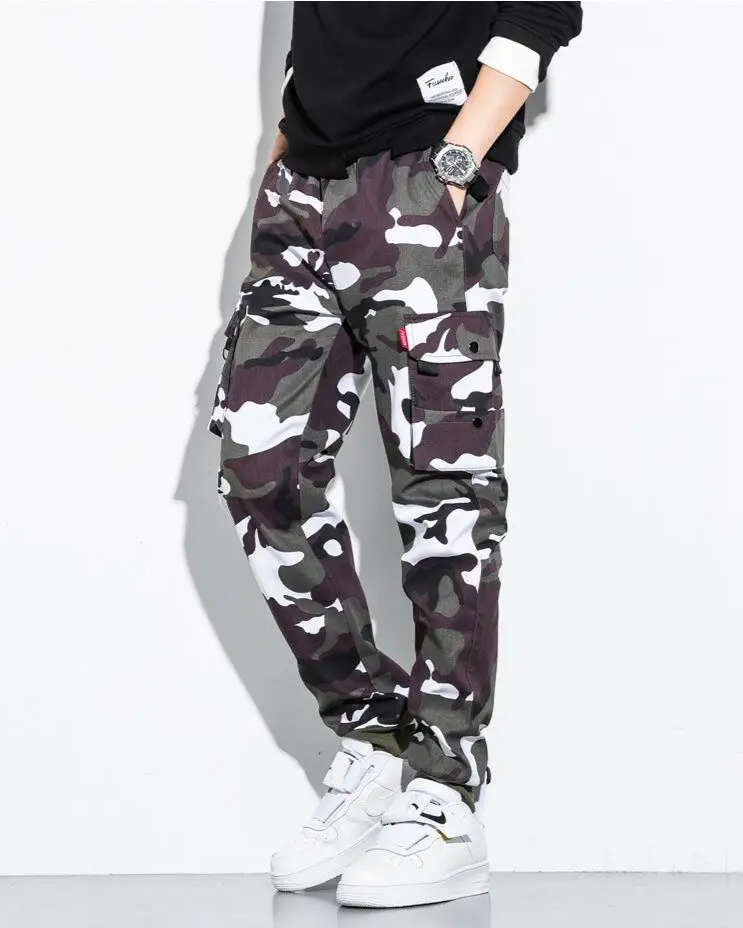 Durable men's camouflage cargo joggers with elastic waist and cuffs, built for active comfort.