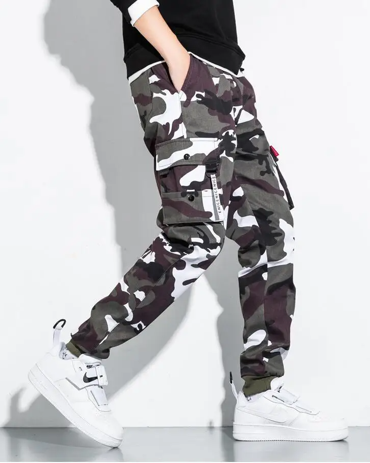 Rugged men's tactical camo cargo pants, perfect utility joggers for outdoor adventures & urban style.