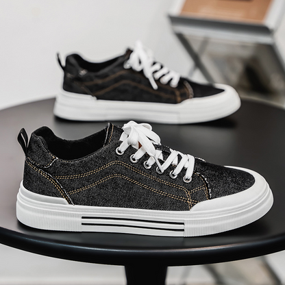 Men's stylish blue denim sneakers, providing comfort and a casual look for everyday fashion.