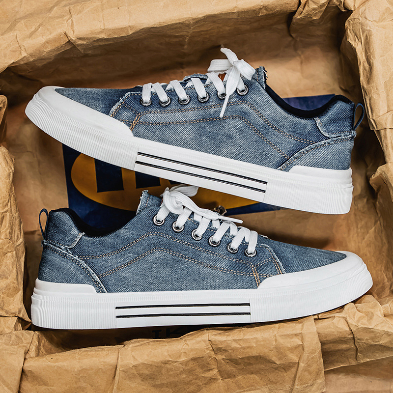 Men's casual blue denim sneakers, designed for stylish everyday comfort and contemporary streetwear.