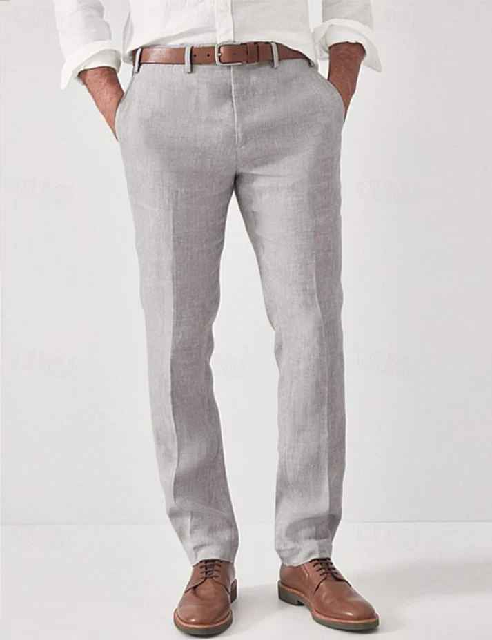 Man in comfortable loose-fit men's harem pants with elastic waist, ideal for vacation & casual wear.