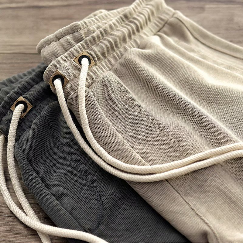 Soft terry men's comfort shorts with drawstring, perfect for casual outings or relaxing loungewear.