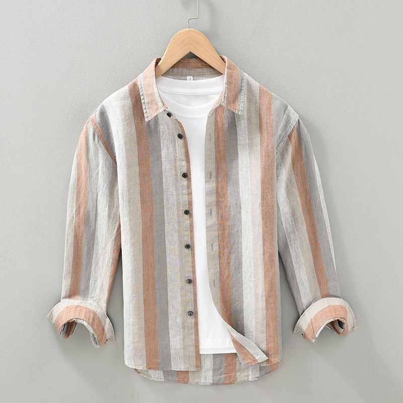 Effortless men's blue striped long-sleeve button-up shirt, ideal for casual spring and summer wear.