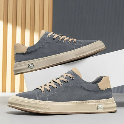Stylish black men's sneakers, lightweight & durable for casual everyday walking comfort.