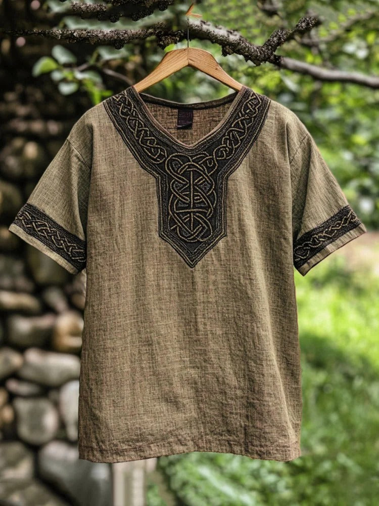 Heritage-inspired men's casual shirt with elegant Celtic knot embroidery, a unique top.
