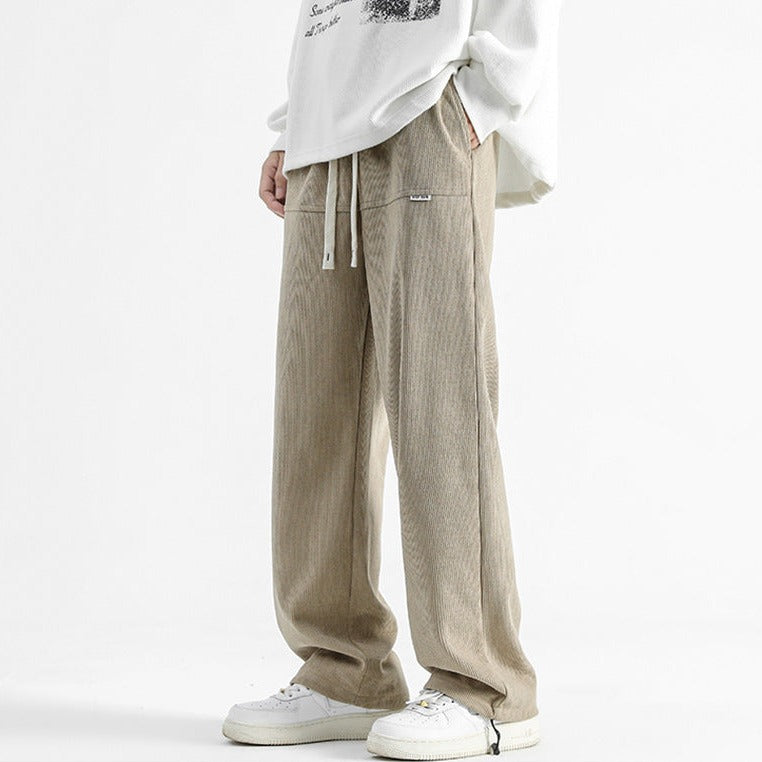 Modern men's fashion: Relaxed fit Malibu casual pants with a comfortable drawstring for everyday style.