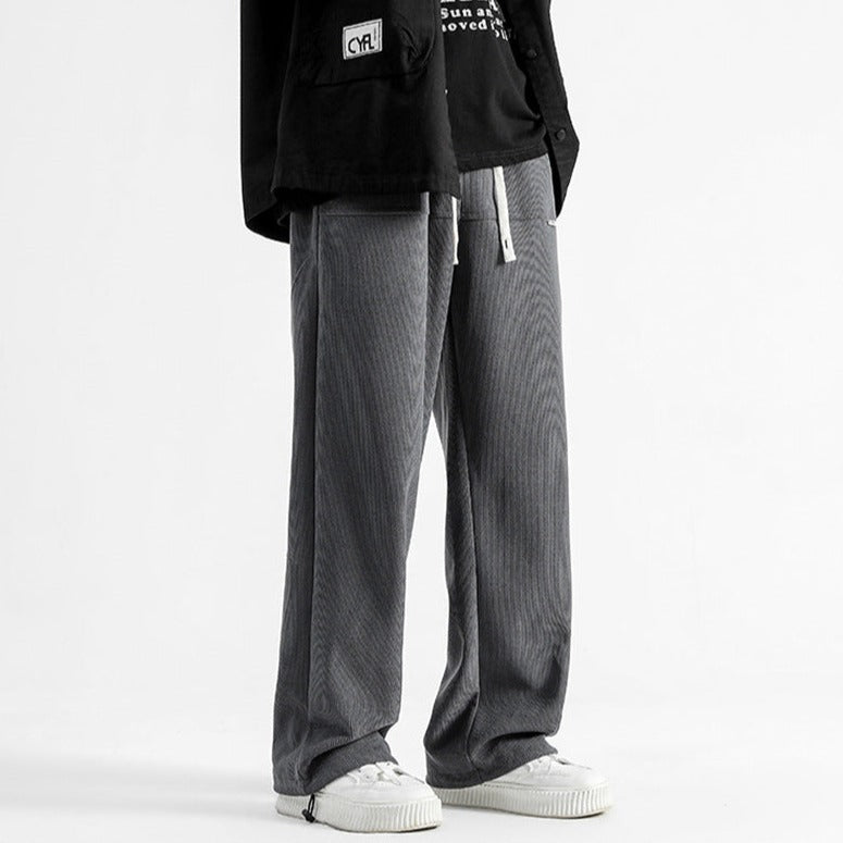 Man wearing comfortable Malibu relaxed fit casual pants outdoors, perfect for everyday style.