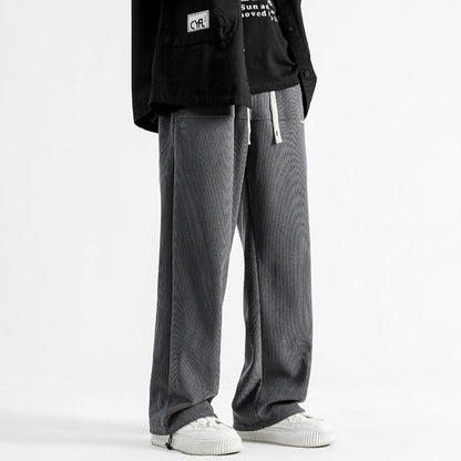 Man wearing comfortable Malibu relaxed fit casual pants outdoors, perfect for everyday style.