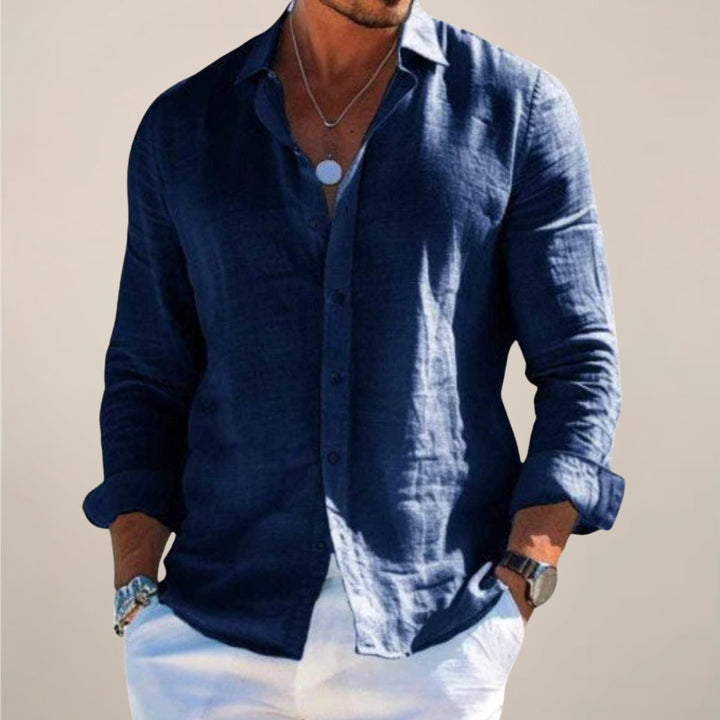 Relaxed fit men's long sleeve button shirt, a modern and comfortable top for any occasion.