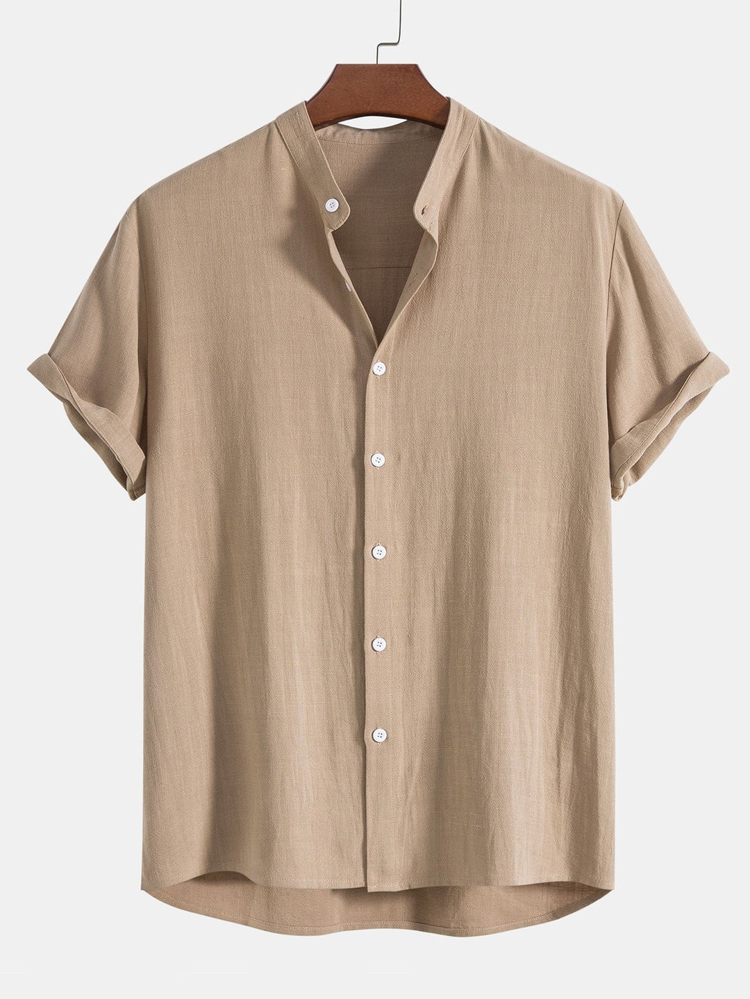 Versatile men's summer outfit: a rolled cuff shirt and matching casual pants for various occasions.