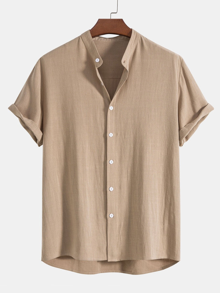 Versatile men's summer outfit: a rolled cuff shirt and matching casual pants for various occasions.