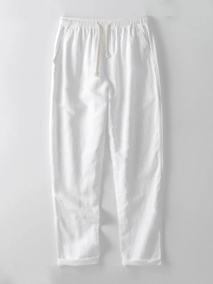 Men's resort wear two-piece set: a stylish rolled cuff shirt & breathable casual pants.