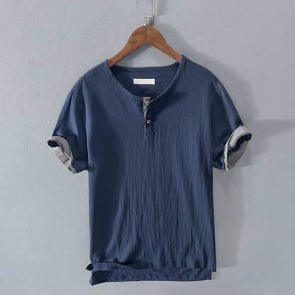 Relaxed fit men's summer henley shirt in a breathable fabric, perfect for casual wear. New arrival.
