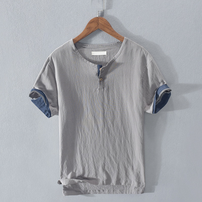 Comfortable short-sleeve men's henley top, ideal for summer fashion. Breathable & lightweight casual wear.