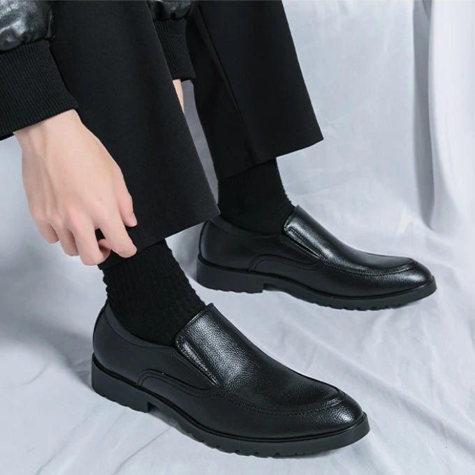 Durable men's slip-on loafers, combining casual comfort with stylish business casual appeal.