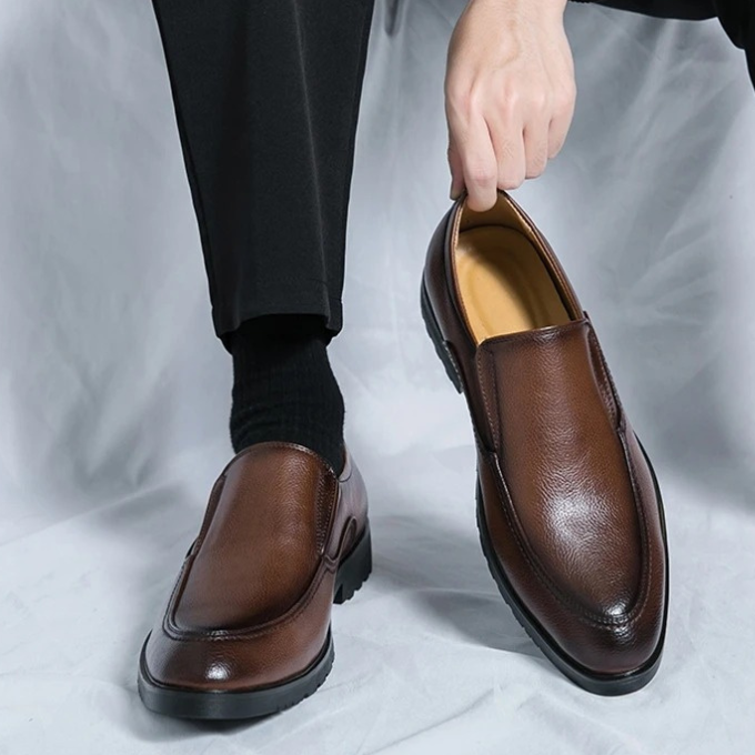 Premium men's slip-on loafers for casual and business casual wear, focused on comfort.