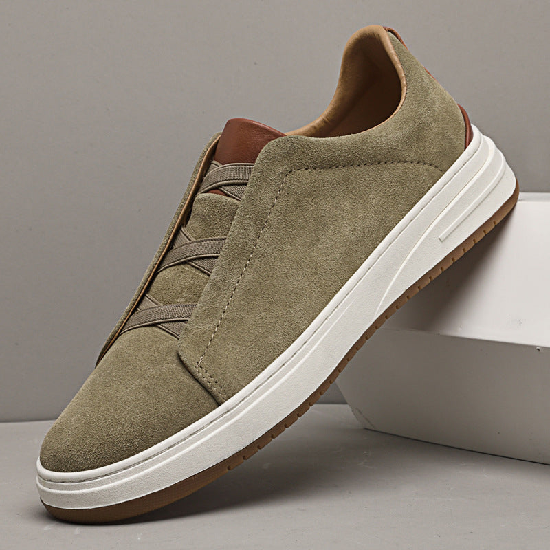 Men's casual slip-on sneakers in a dark shade, perfect for everyday comfort and easy wear.